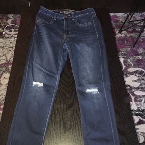 Distressed blue jeans